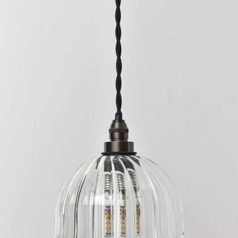 Bodium Bathroom Ribbed Glass Pendant Light with adjustable flex, handcrafted ribbed glass shade, and IP44 rating for bathroom use