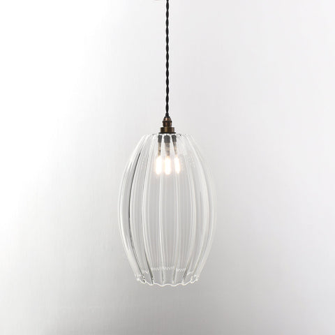 Camber Large Ribbed Glass pendant light with adjustable flex, handcrafted ribbed glass shade, ideal for stylish bathroom lighting.