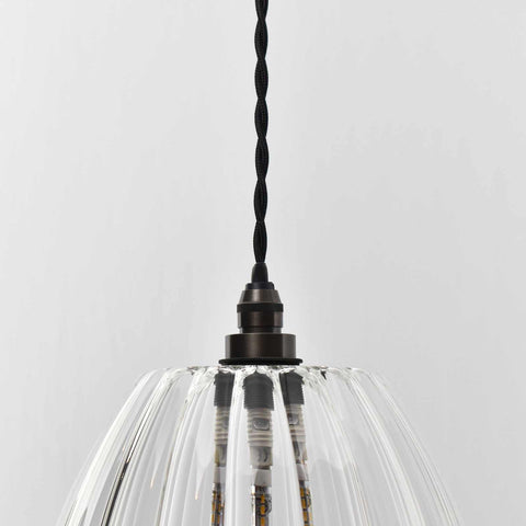Camber large ribbed glass bathroom pendant light with adjustable black flex and dark metal fittings