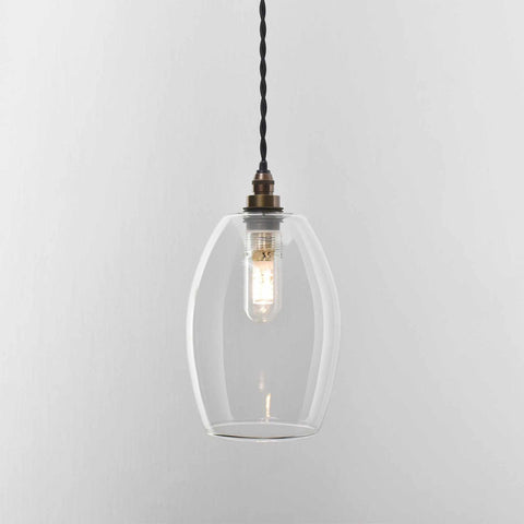 Camber small clear glass shade pendant light with exposed bulb and twisted cord for modern bathroom lighting
