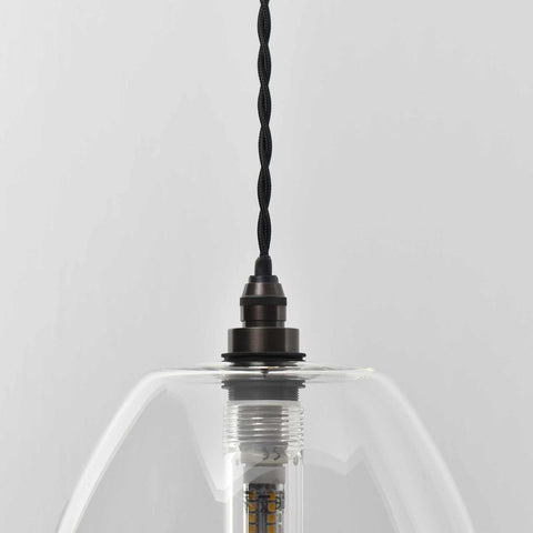 Camber Large Clear Glass Shade bathroom pendant light with adjustable black cord and metal fitting, minimalist modern design.