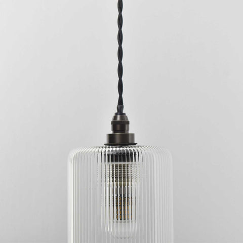 Brook Small Ribbed Glass Shade pendant light with handblown cylindrical ribbed glass design and black twisted cord for bathroom lighting