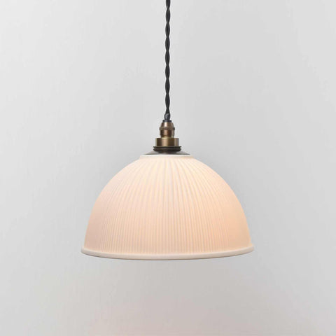 Denton Medium Ribbed ceramic shade bathroom pendant light with soft warm glow and ribbed texture