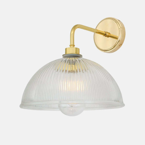 Maris Bathroom Wall Light with straight arm, brass finish, and prismatic glass shade for ambient bathroom lighting