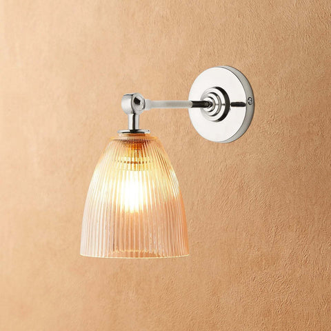 Tiny Qilin Bathroom Wall Light with prismatic glass shade and chrome finish mounted on bathroom wall