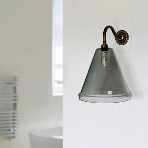 Rye Medium Smoked Glass Shade Bathroom Wall Light with grey smoked hand-blown glass and brass swan neck mount