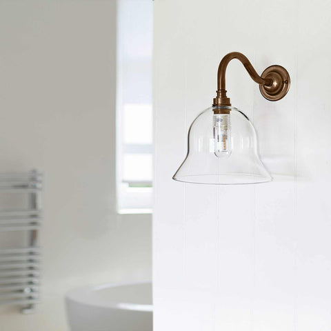 Bodium small clear glass shade bathroom wall light with swan neck fitting, elegant UK handcrafted design.