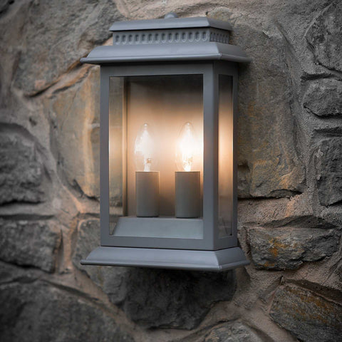 Belvedere Outdoor charcoal grey wall light with dual bulbs mounted on stone wall for exterior lighting