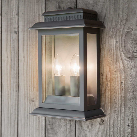 Belvedere Outdoor charcoal grey dual-bulb wall light mounted on wooden exterior wall