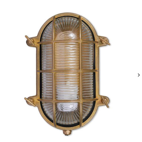 Devonport Bulkhead Wall Light vintage-style brass outdoor wall light with ribbed glass and protective grid