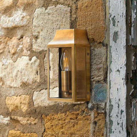 Pooky Crail Wall Light solid brass outdoor lantern on stone wall