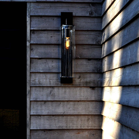 Contemporary Dome Outdoor Wall Light in black powder-coated metal mounted on wooden exterior wall illuminating with warm light