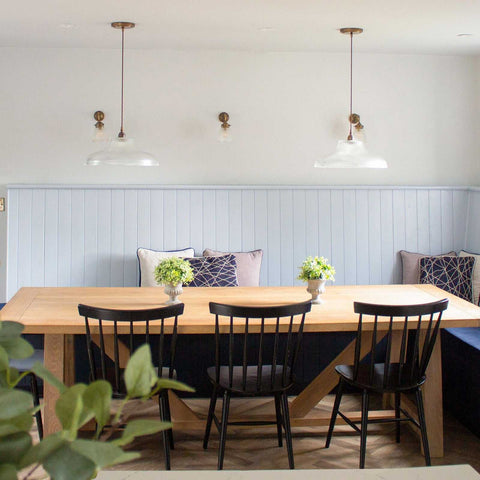 Mono Prismatic Pendant Light with prismatic glass shades hanging above a wooden dining table in a modern dining room