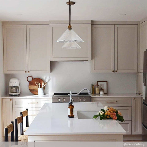 Modern kitchen interior featuring Rebell Prismatic Glass Pendant Light with prismatic glass shade and sleek white cabinetry