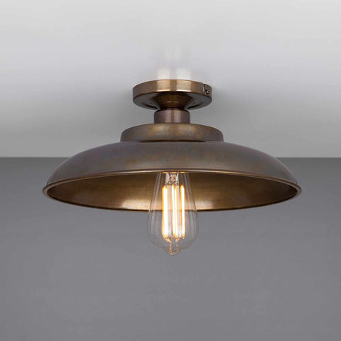 Telal Flush Ceiling Light with vintage industrial design and exposed bulb for minimalist home lighting