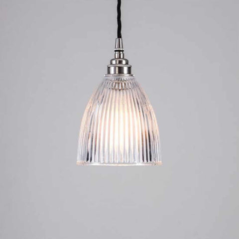 Small Strand Prismatic Glass pendant light with ribbed glass shade and metal fixture hanging on black cord
