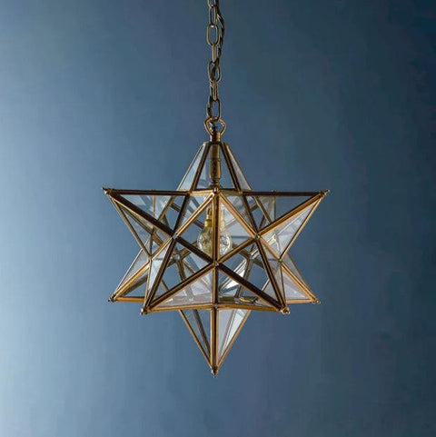 Pooky Stella Star Pendant Light medium clear glass star-shaped ceiling light with brass frame and chain suspension