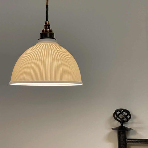 Denton Medium Ribbed ceramic pendant light with handcrafted porcelain shade and soft warm illumination