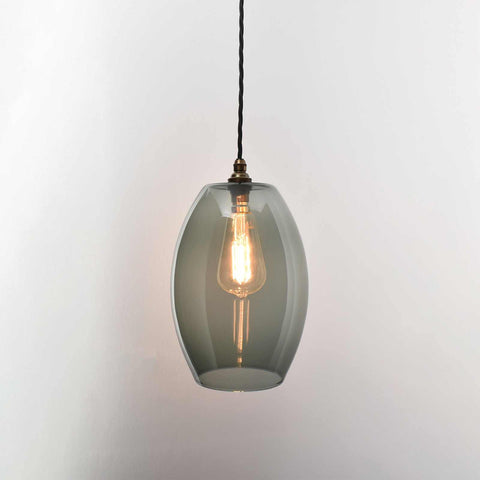 Camber large smoked glass shade pendant light with illuminated filament bulb and twisted black cord