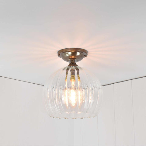 Soho medium ribbed glass shade flush ceiling light with hand-blown glass and antique brass fittings for low ceilings