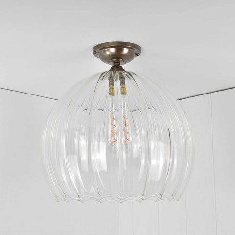 Soho extra large ribbed glass globe flush ceiling light with clear ribbed glass and antique brass fitting