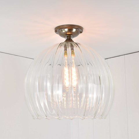 Soho extra large ribbed glass globe flush ceiling light with hand-blown glass and metallic fitting