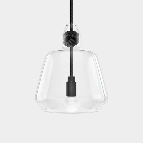 Contemporary large clear glass pendant light with black monkey fist knot detail and exposed bulb hanging from black cord