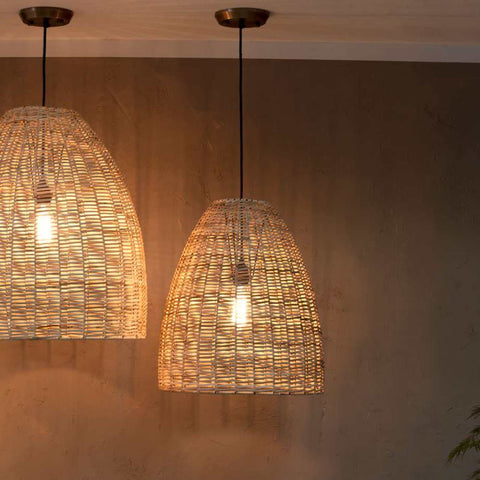 Nkuku Noko Wicker medium conical pendant light with hand-woven natural wicker design and warm diffused glow