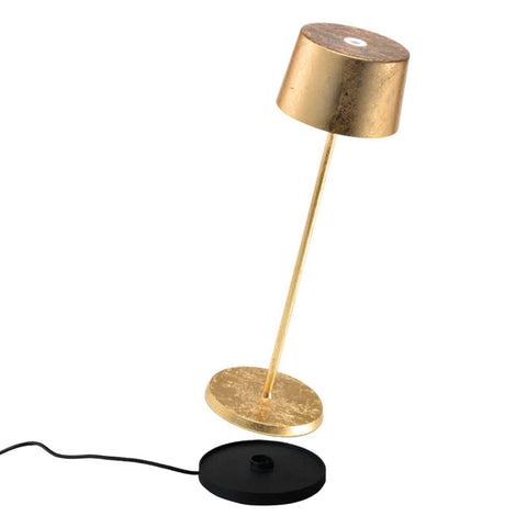 Zafferano Olivia Pro rechargeable table lamp with gold finish and black base, modern minimalist Italian design