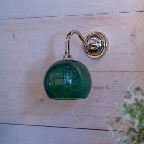 Soho Small Teal Glass Bathroom Wall Light with chrome fixture and teal glass shade on wooden wall