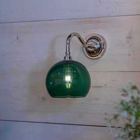 Soho Small teal glass shade bathroom wall light with chrome fixture and IP44 rating, mounted on white wooden wall