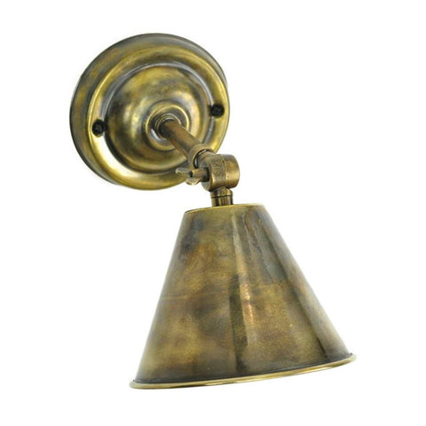 Henley adjustable wall light in antique brass with a rotatable bell-shaped shade and dimmable feature.