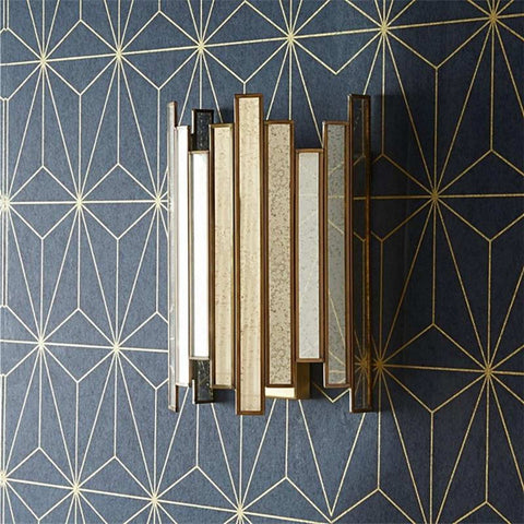 Pooky Melville Vintage Glass Wall Light with antique brass finish and Art Deco mercury glass strips on geometric blue wallpaper