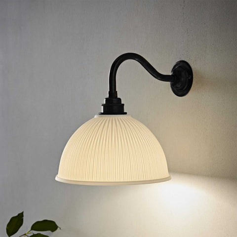 Denton Ribbed Ceramic medium wall light with ribbed ceramic shade and black metal arm