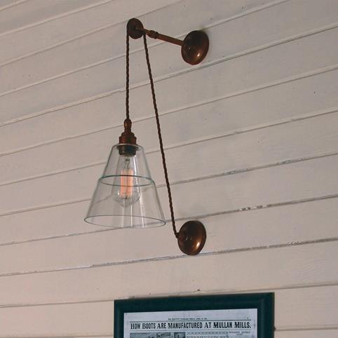 PULLEY Unique Industrial Clear Glass Shade Wall Light in Antique Brass