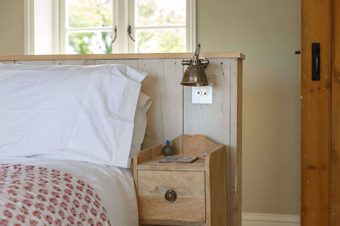 Wall light height guide illustrating ideal placement for optimal lighting and ambiance in rooms