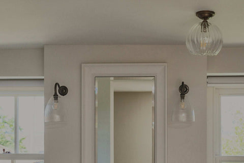 modern bathroom wall lights mounted on tiled wall providing stylish and safe illumination