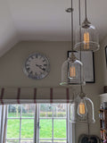 Hythe Small Clear Glass Shade cluster pendant light with handblown clear glass bell-shaped shades