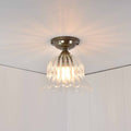 Bodium Small ribbed glass shade flush ceiling light with flower-inspired design and warm ambient lighting