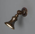 Antique brass finish swatch for Accra Traditional Small Brass Spotlight, showing a warm aged brass tone with subtle vintage patina.