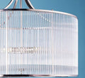 Artemis Chandelier pendant light with brass frame and clear glass rods in modern vintage design