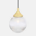 Laguna Bathroom Pendant light with ribbed glass globe and brass finish, modern and elegant design for bathrooms and kitchens