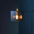 Bramley Bathroom Smoked Globe Pendant Light with smoked glass shade and decorative bulb.