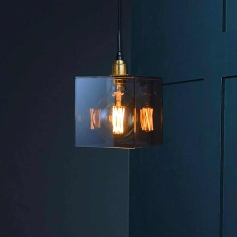 Bramley Bathroom Smoked Globe Pendant Light with smoked glass shade and decorative bulb.