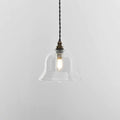Small clear glass bathroom pendant light with adjustable black twisted cord and exposed bulb design