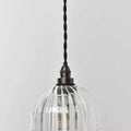 Bodium Bathroom Ribbed Glass Pendant Light with adjustable flex, handcrafted ribbed glass shade, and IP44 rating for bathroom use