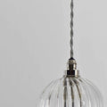 Bodium Bathroom Ribbed Glass Pendant Light with adjustable flex and handcrafted ribbed glass shade, IP44 rated for bathroom use
