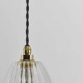 Camber small ribbed glass shade bathroom pendant light with brass fixture and adjustable black twisted cord
