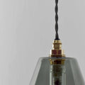 Rye Medium Smoked Glass bathroom pendant light with brass fittings and twisted black cord