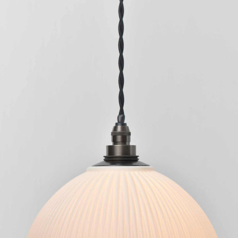 Denton Medium Ribbed ceramic bathroom pendant light with ribbed shade and warm glow